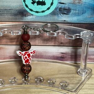 Red and Brown Beaded Keychain with Cow Charm